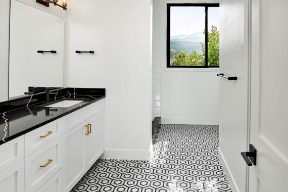 Primary bathroom with detailed tiles at Rendezvous Townhomes