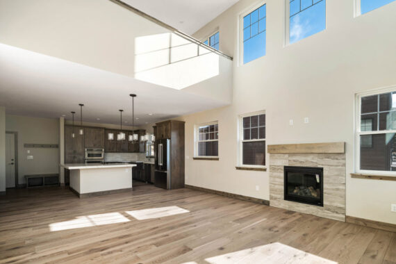 Kitchen and living room in model home Moosehorn Downhill Cabin