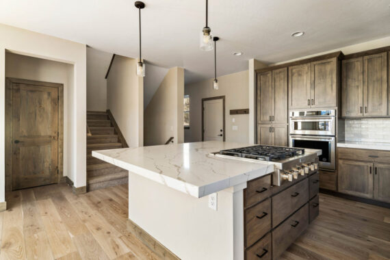 Kitchen island in model home Moosehorn Downhill Cabin