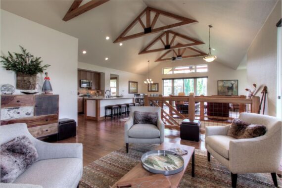 Furnished living room in model home at Rendezvous Bighorn Cabin