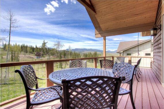 Furnished patio in model home at Rendezvous Bighorn Cabin