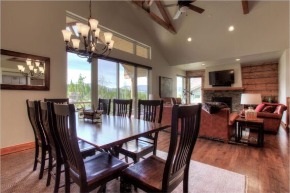 Furnished living room in model home at Rendezvous Bighorn Cabin