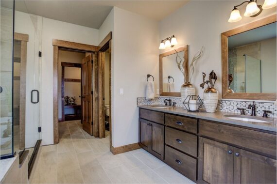 Furnished bathroom in model home at Rendezvous Bighorn Cabin II