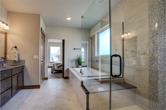 Primary bathroom in model home at Rendezvous Bighorn Cabin II