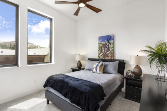 Furnished bedroom in model home at Rendezvous