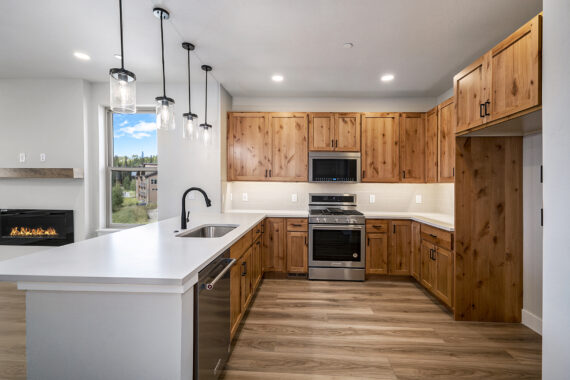 Kitchen with wooden cabinets and modern appliances