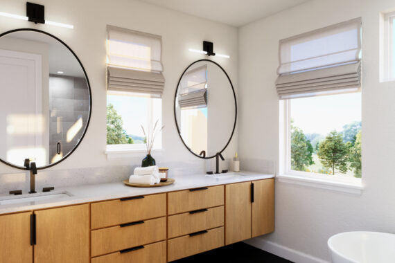 Modern bathroom with round mirrors and natural light