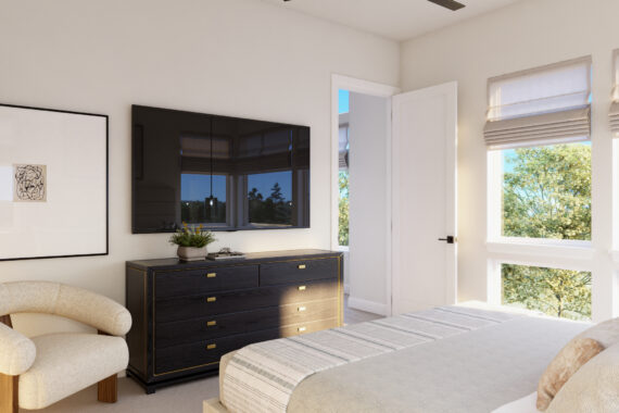 Bright bedroom with large windows and modern decor.