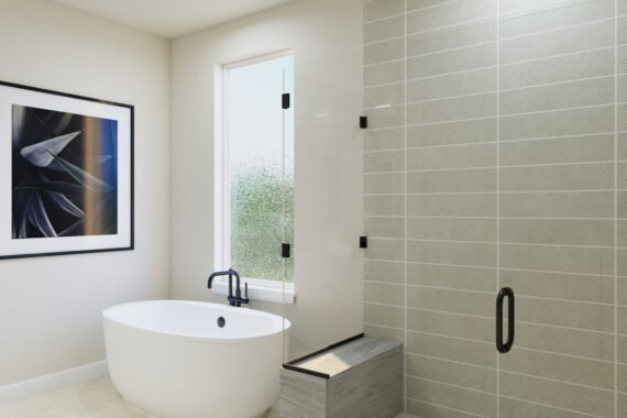 Modern bathroom with a bathtub, shower, and framed art