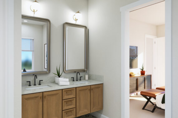 Wooden double vanity in a bathroom with mirrors.