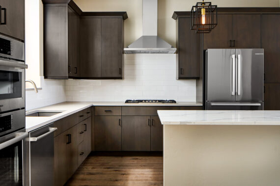 Kitchen with island in model home at Rendezvous